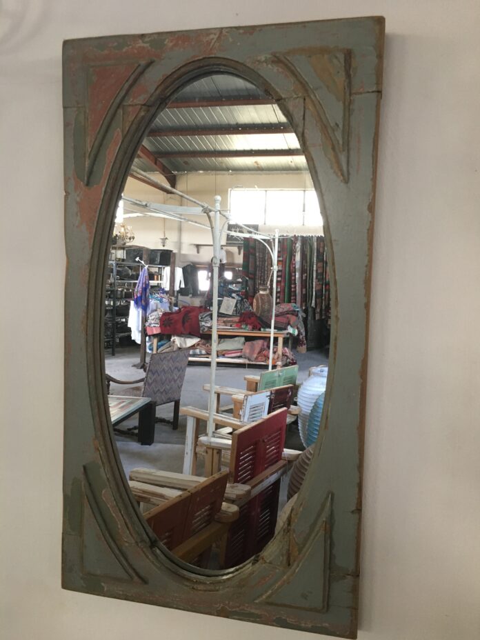 mirror in an old window frame