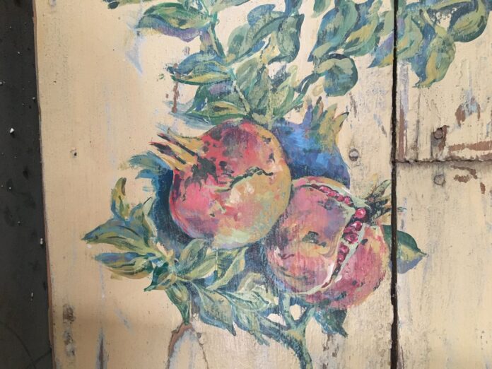 Pomegranate, painting on a piece of old wood, old greek window