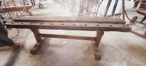 wooden bench handmade out of a carpenter s working bench , elaborate legs , antique ,vintage