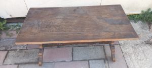 pair of  old coffee tables in dark color , short , with curved legs , handmade