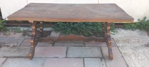 pair of  old coffee tables in dark color , short , with curved legs , handmade