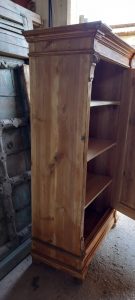 old wooden wardrobe, closet, with shelves, in natural color wood, restored, handmade, with carvings on the 4 corners, antique, vintage