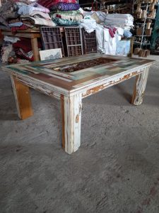 coffee table from old colorful pieces of wood from old furniture that could not be restored, with an old iron railing in the center which will be covered with glass (not included), sitting room /living room small table, the frame is from an old door case in an washed out white color