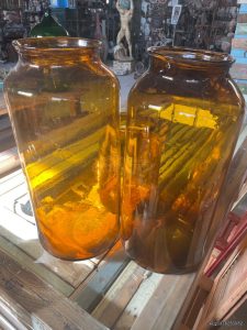 old glass bottles, old glass vessels, demijohns , carboys, bottles, flasks, jars, pots, phials, ampoules and other containers, of glass different shapes, sizes, colors and prices
